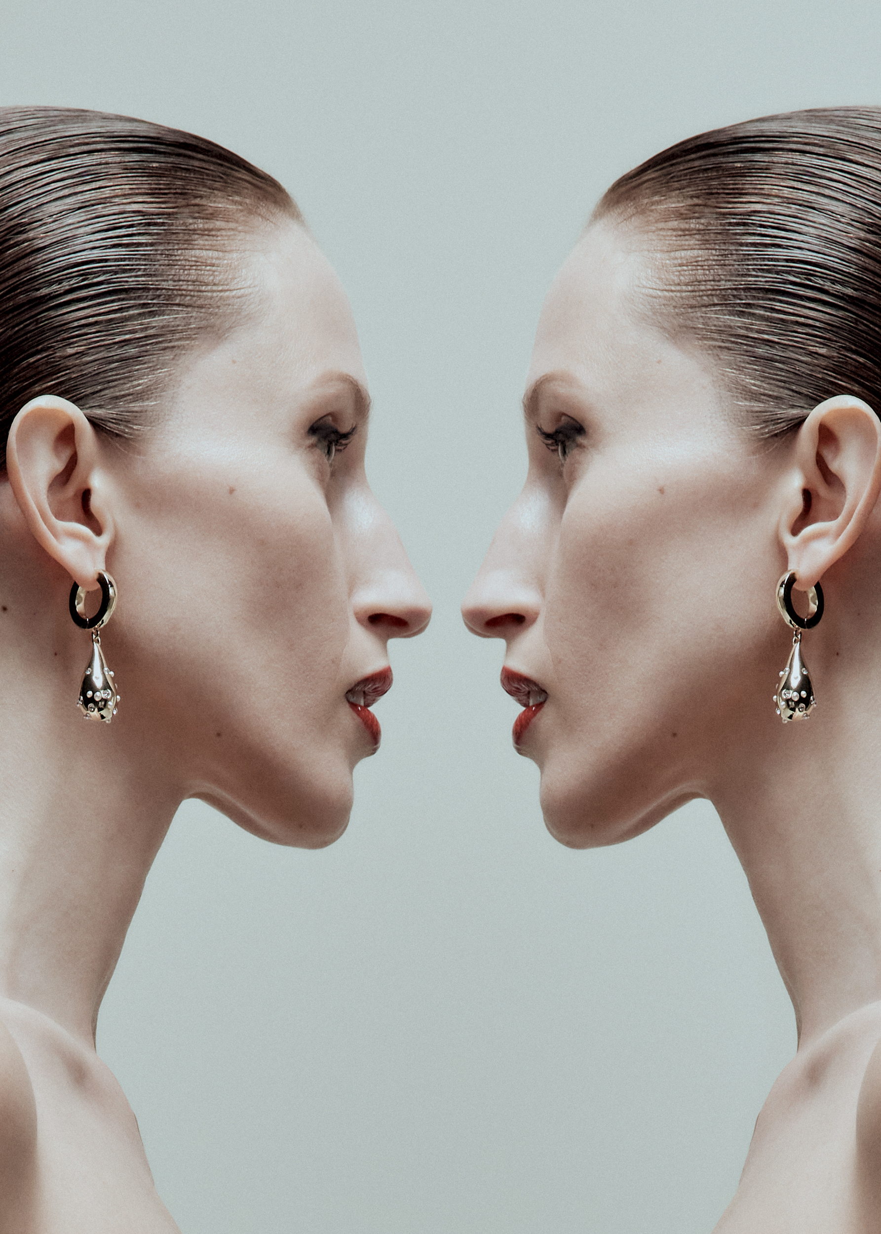 Closeup of woman wearing gold earring