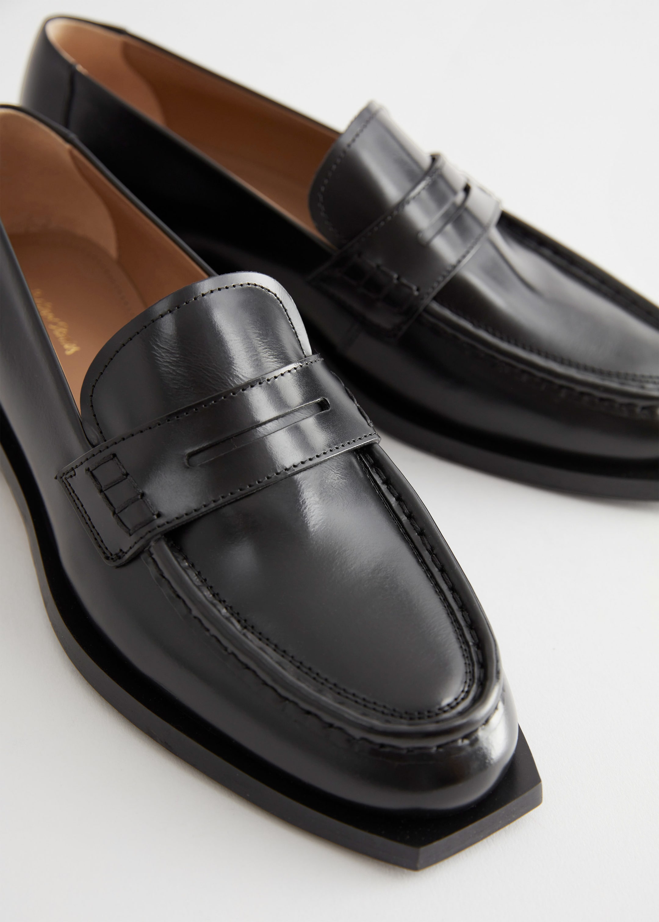 Classic Leather Penny Loafers - {{variantName}} - Descriptive Detail